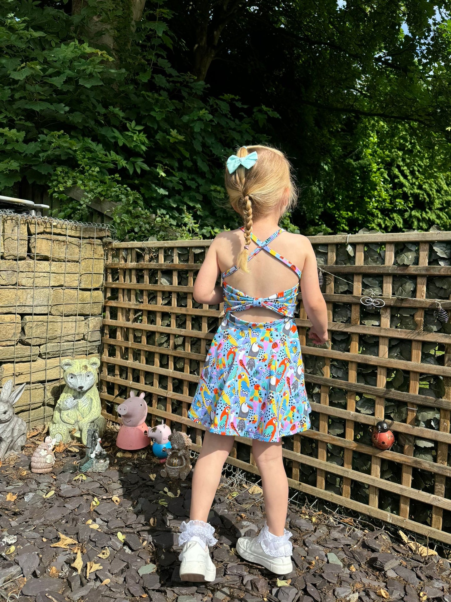 Cross back bow dress